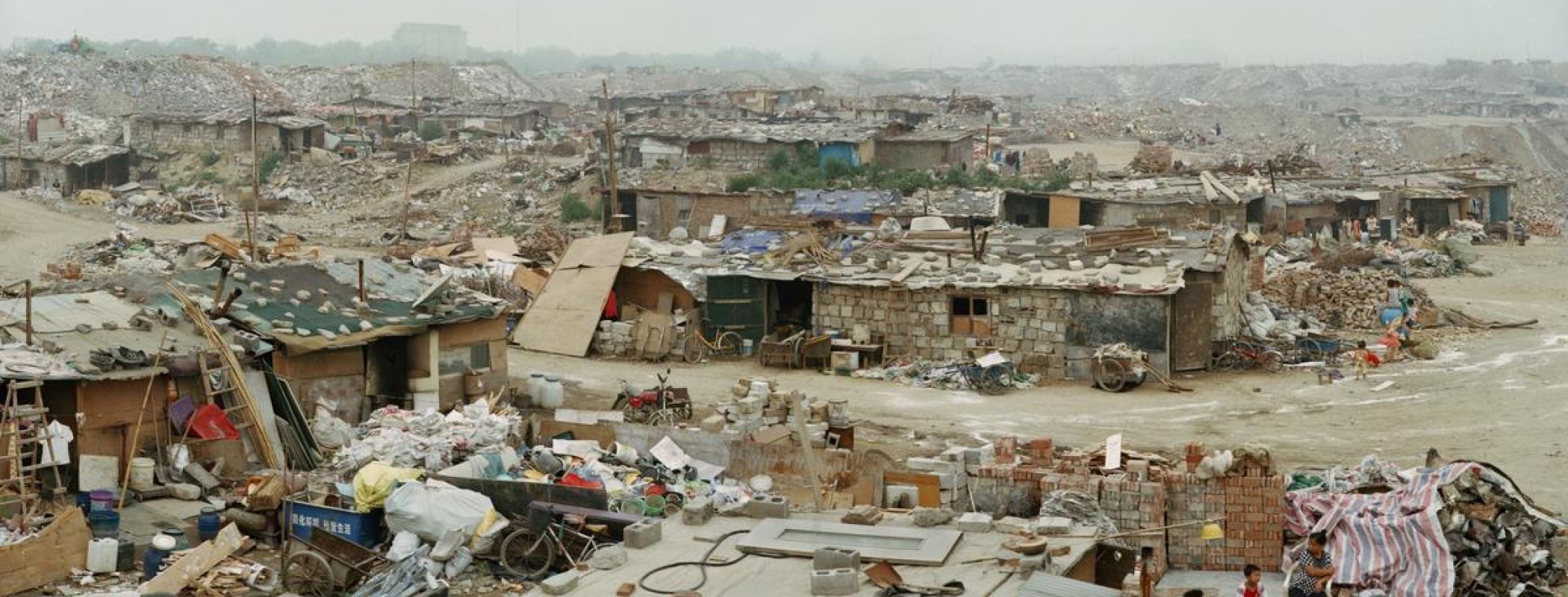 Figure 11:14. Wang Jiuliang, Beijing Besieged by Waste – Changxindian township, Fengtai district, 39°52′22″N 116°11′20″E.,  2009, digital inkjet print on fine paper, 110 x 220 cm, image courtesy of Wang Jiuliang and White Rabbit Collection, Sydney. 