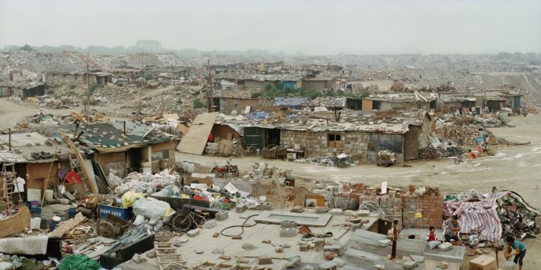 Figure 11:14. Wang Jiuliang, Beijing Besieged by Waste – Changxindian township, Fengtai district, 39°52′22″N 116°11′20″E.,  2009, digital inkjet print on fine paper, 110 x 220 cm, image courtesy of Wang Jiuliang and White Rabbit Collection, Sydney. 